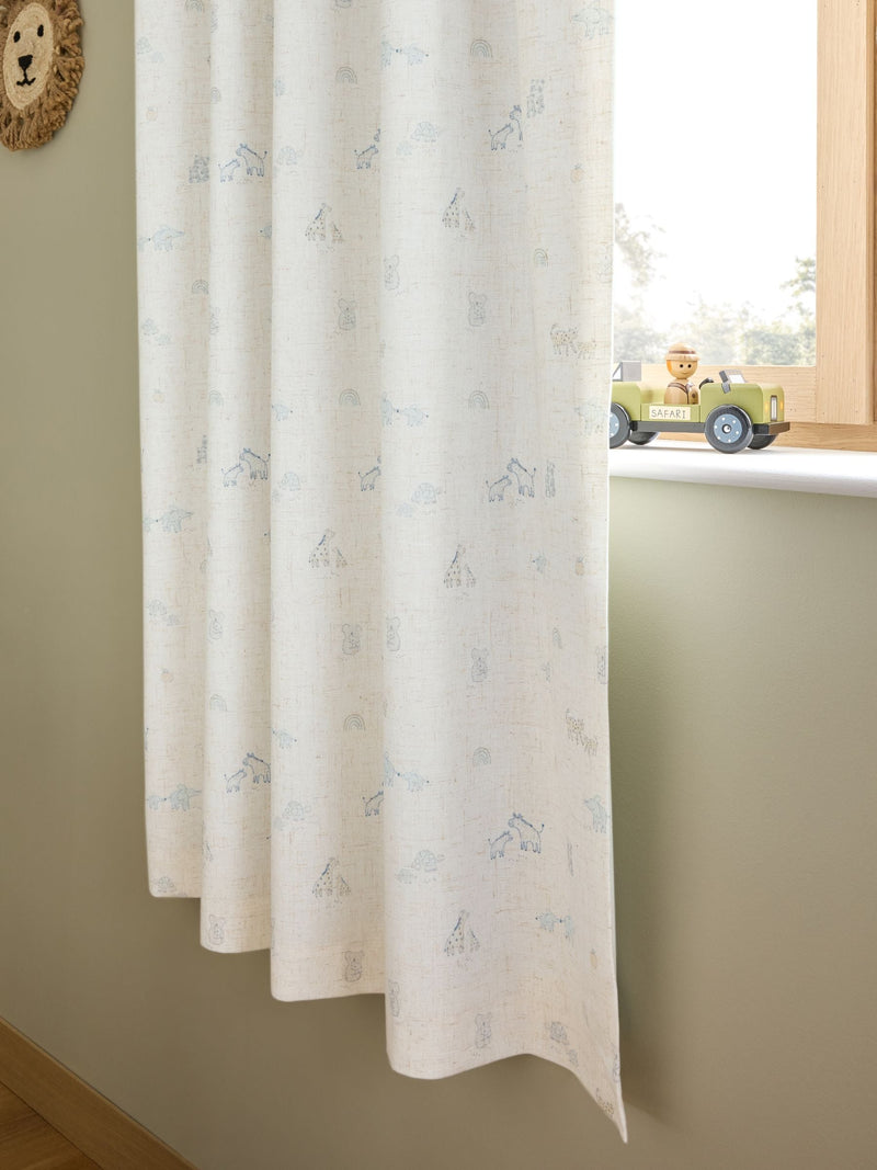 Neutral Mini Jungle pencil pleat blackout curtains imported from the UK