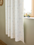 Neutral Mini Jungle pencil pleat blackout curtains imported from the UK