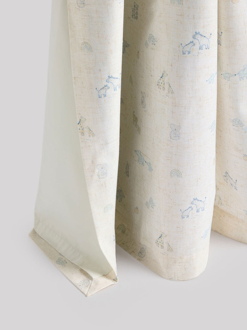Neutral Mini Jungle pencil pleat blackout curtains imported from the UK