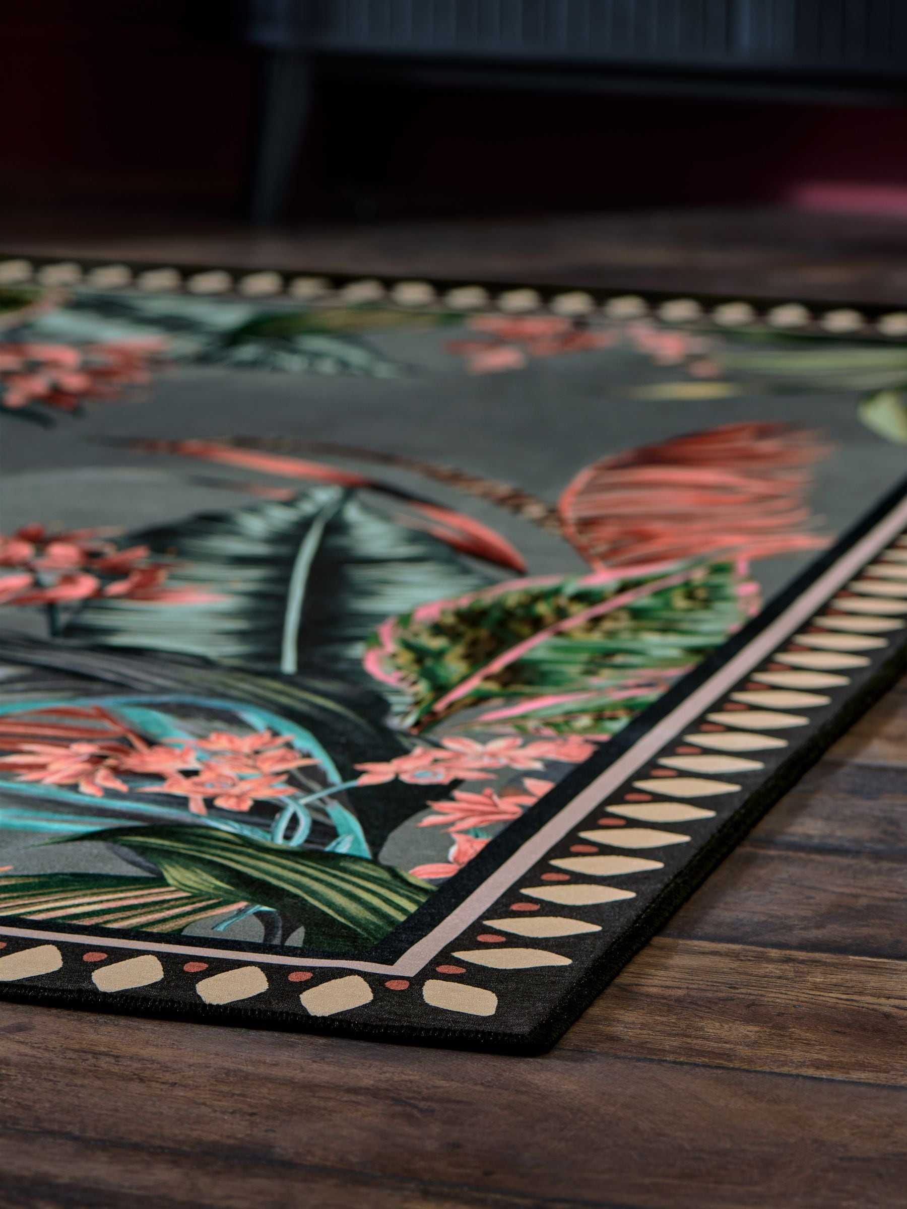 Grey washable tropical border rug, imported from the UK