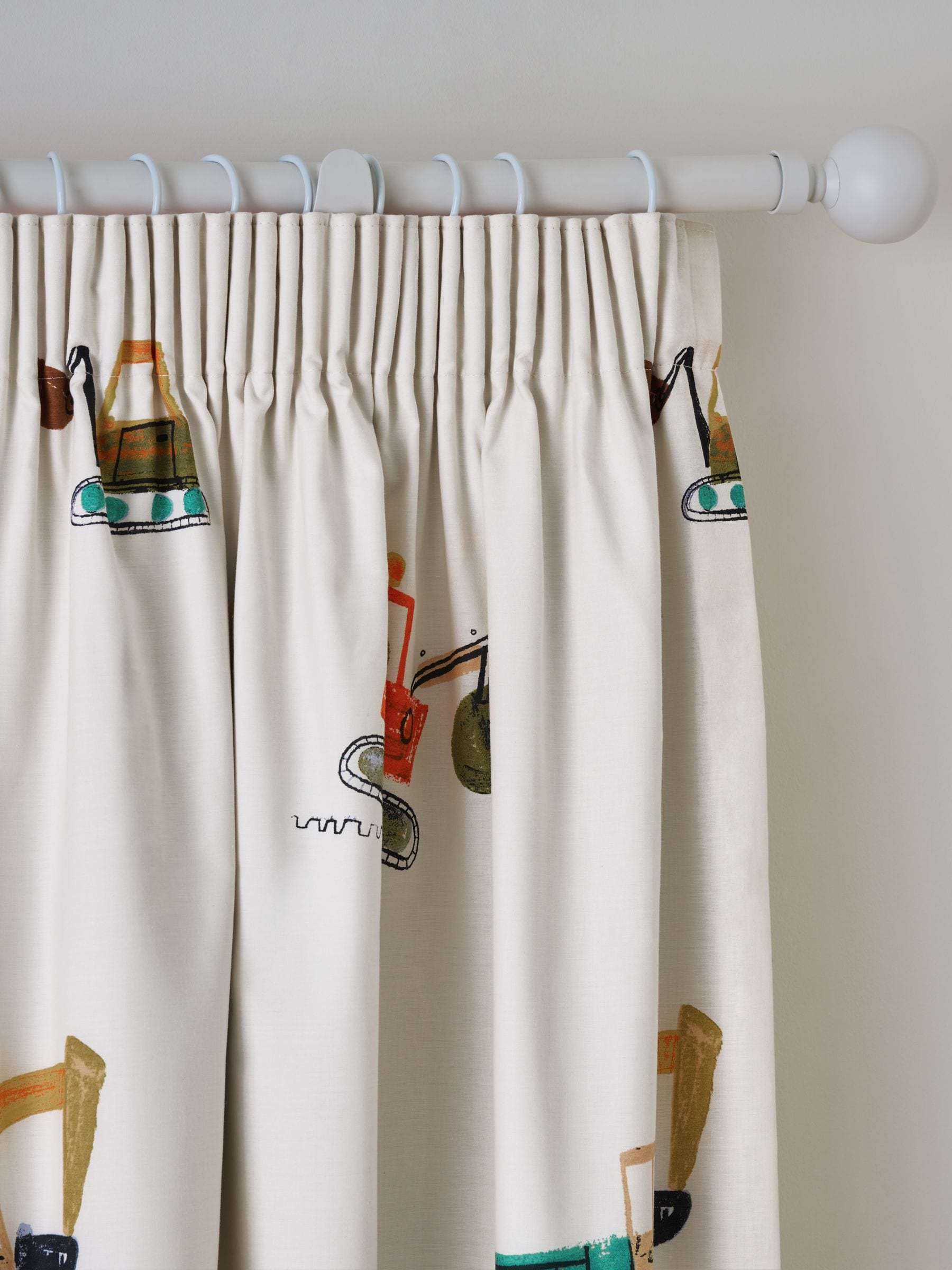 Neutral Diggers pencil pleat blackout curtains, imported from the UK