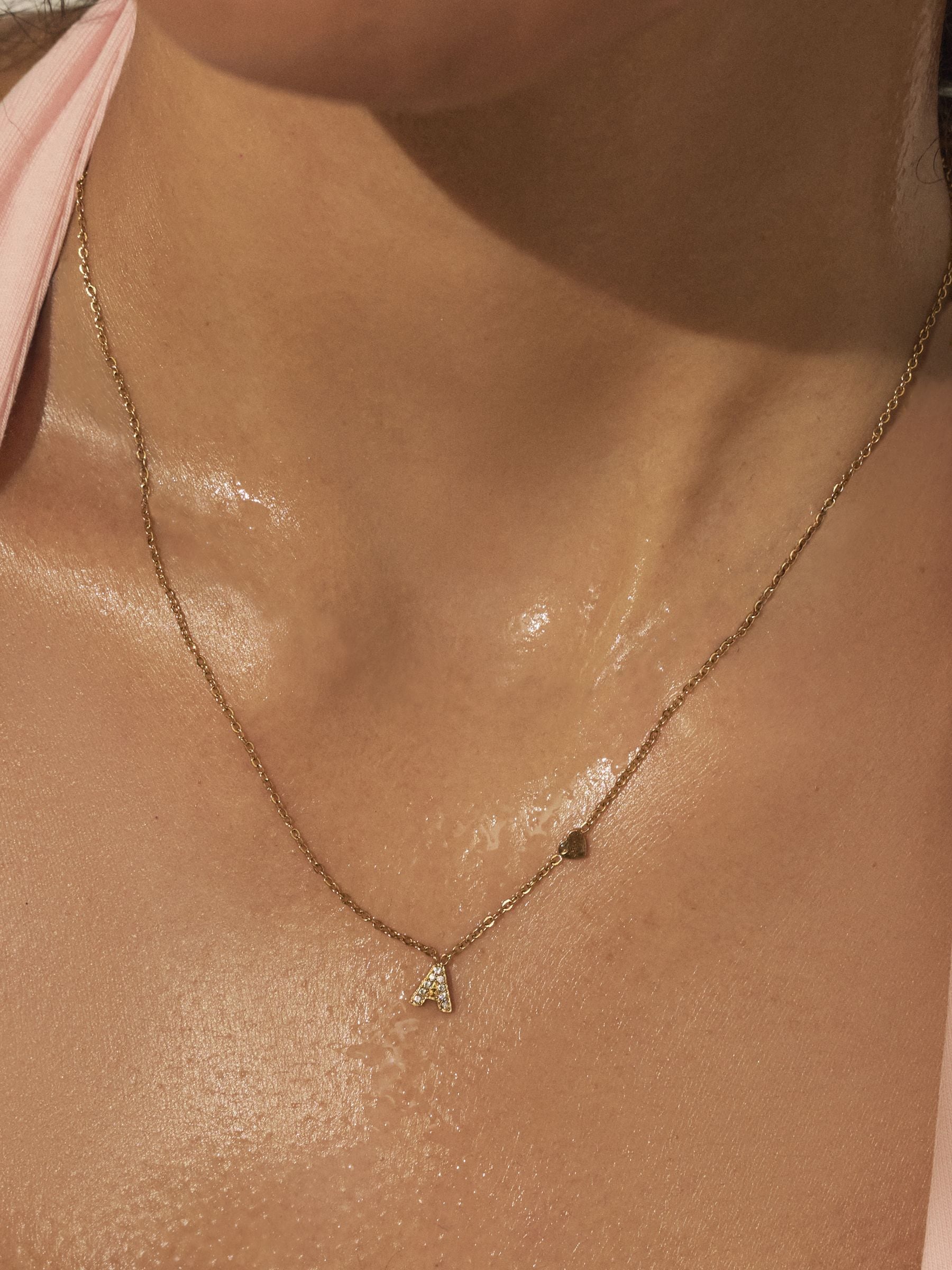 Gold tone stainless steel initial necklace, imported from the UK