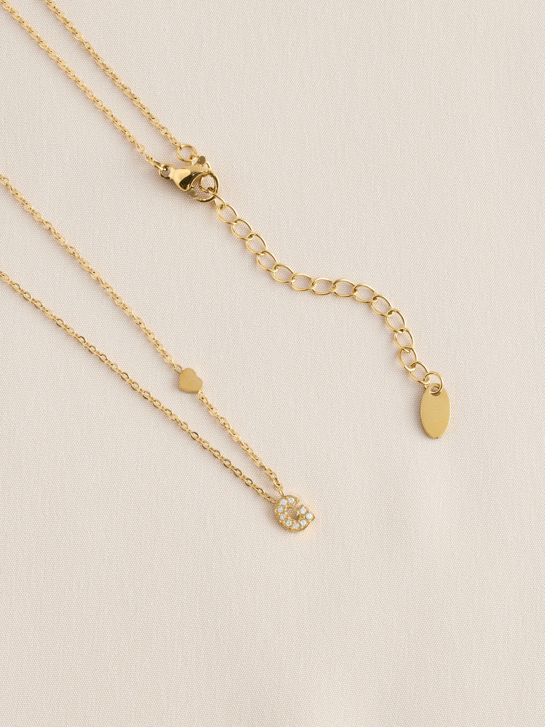 Gold tone stainless steel initial necklace, imported from the UK