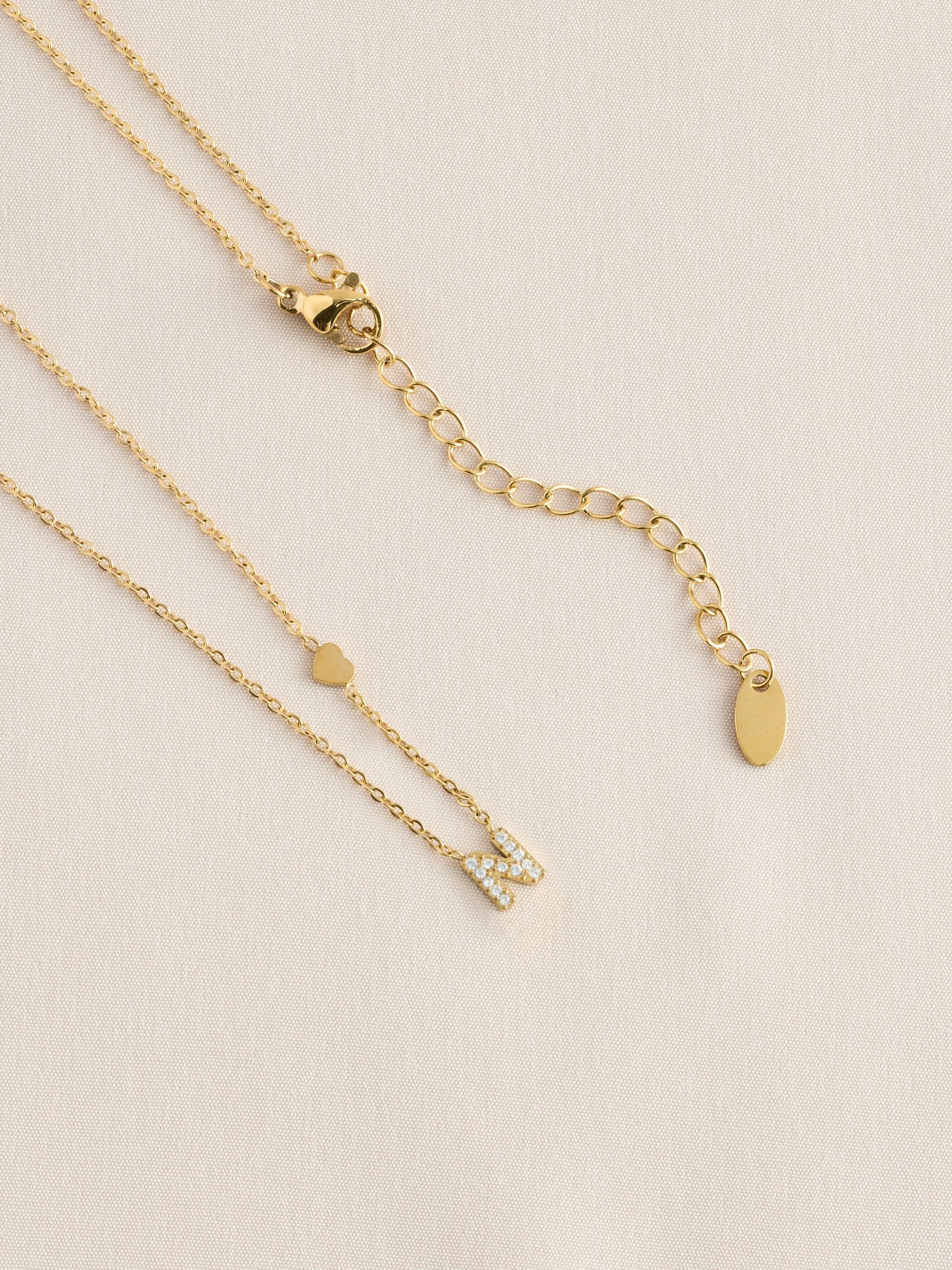 Gold tone stainless steel initial necklace, imported from the UK