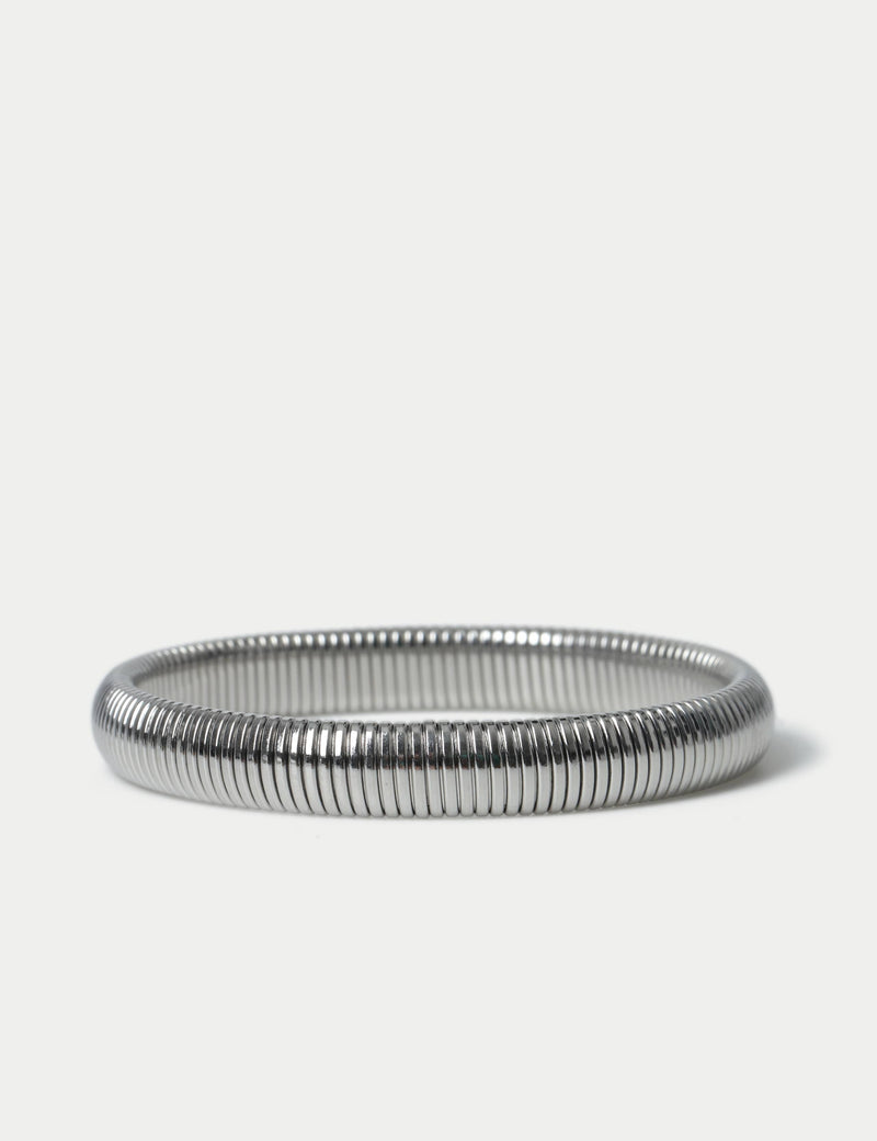 M&S silver tone stainless steel stretch bracelet, imported from the UK