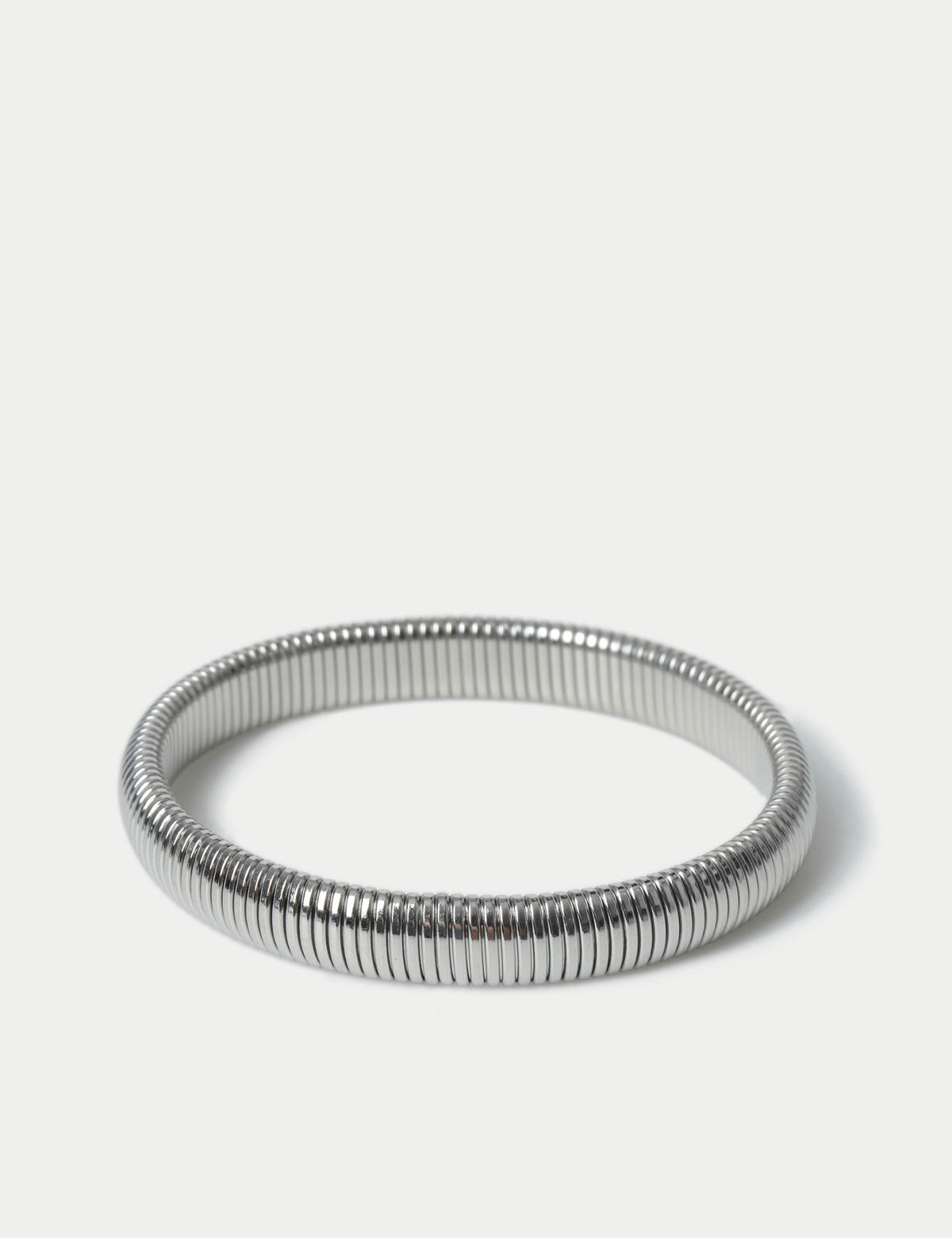 M&S silver tone stainless steel stretch bracelet, imported from the UK