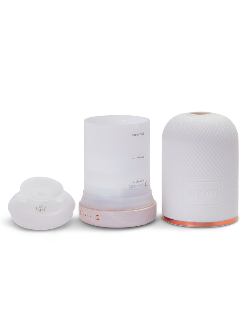 NEOM Wellbeing Pod aromatherapy diffuser with ceramic cover and wood base (British brand)