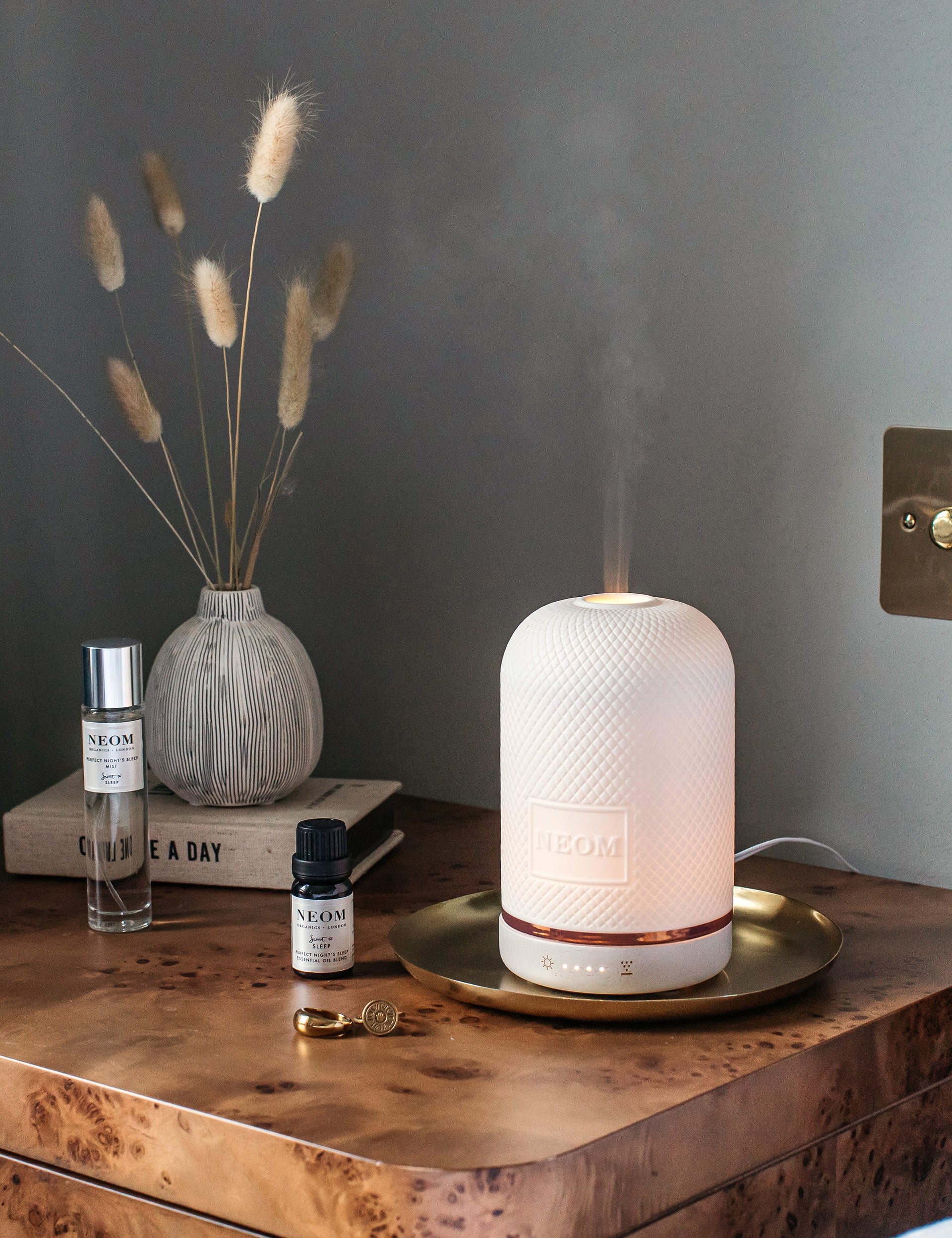 NEOM Wellbeing Pod aromatherapy diffuser with ceramic cover and wood base (British brand)