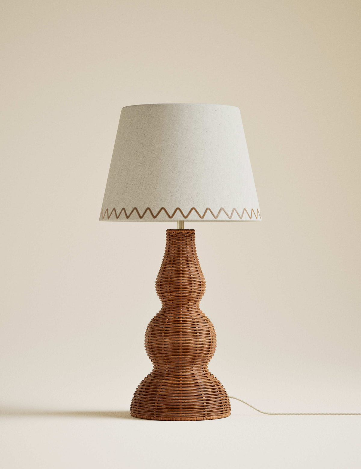 Wicker graduated base table lamp, imported from the UK