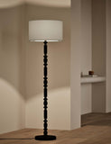 Bobbin floor lamp with wooden detailing and cylinder shade, imported from the UK