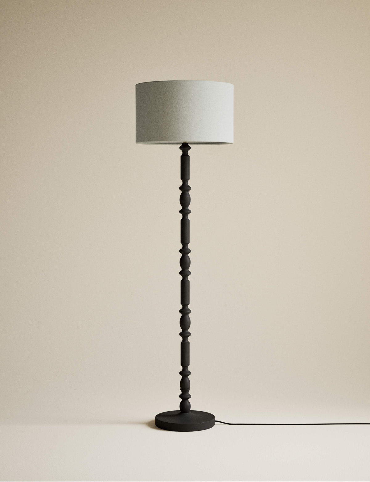 Bobbin floor lamp with wooden detailing and cylinder shade, imported from the UK