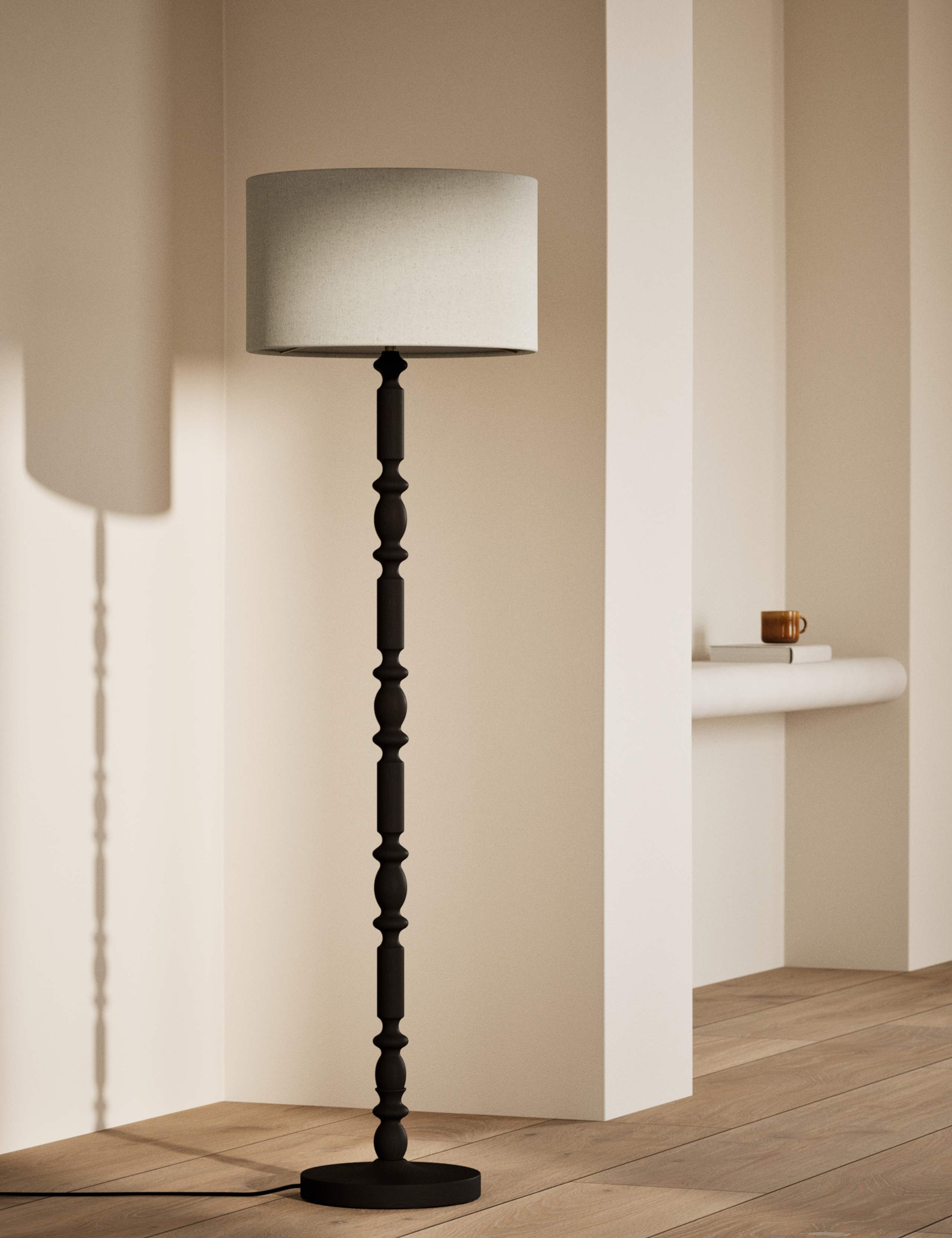 Bobbin floor lamp with wooden detailing and cylinder shade, imported from the UK