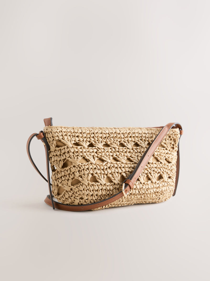 Natural raffia effect cross-body bag with recycled lining (British brand)