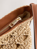 Natural raffia effect cross-body bag with recycled lining (British brand)