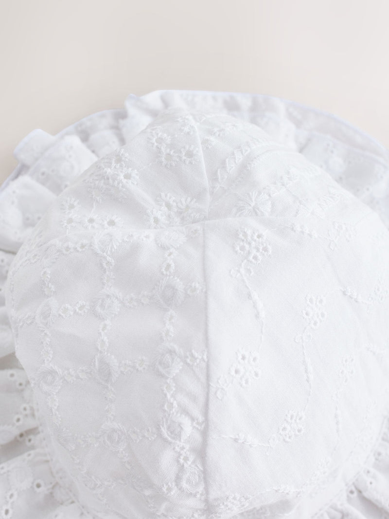 White broderie bucket baby hat, imported from the UK