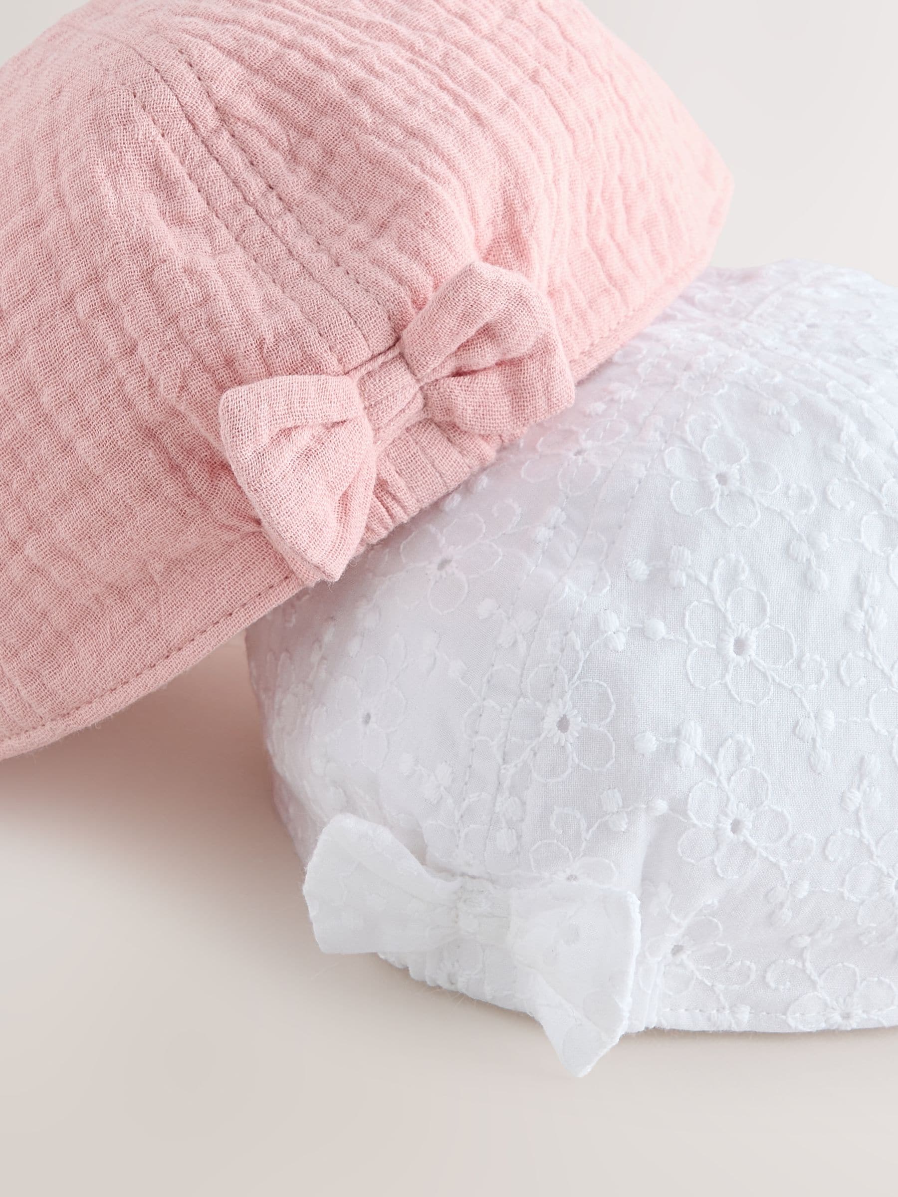 Baby hats pink and white broderie bow back 2 pack, UK version