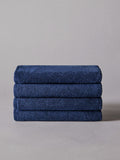 The Set sage green popcorn textured hand towels 4 pack, UK version