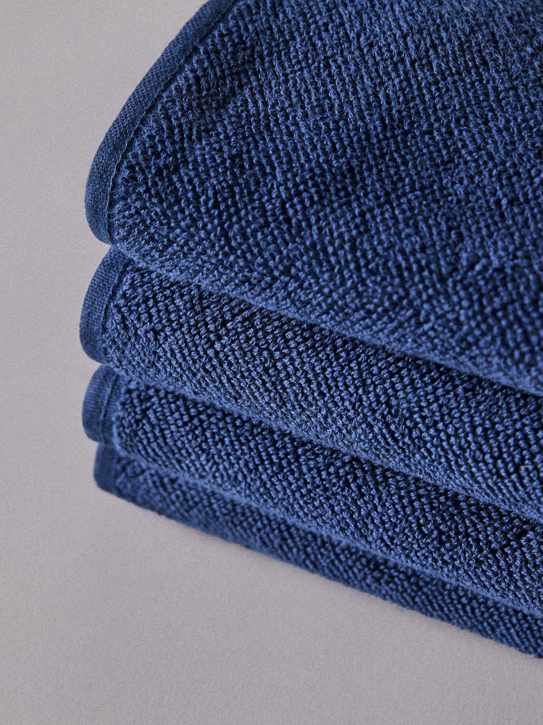 The Set sage green popcorn textured hand towels 4 pack, UK version