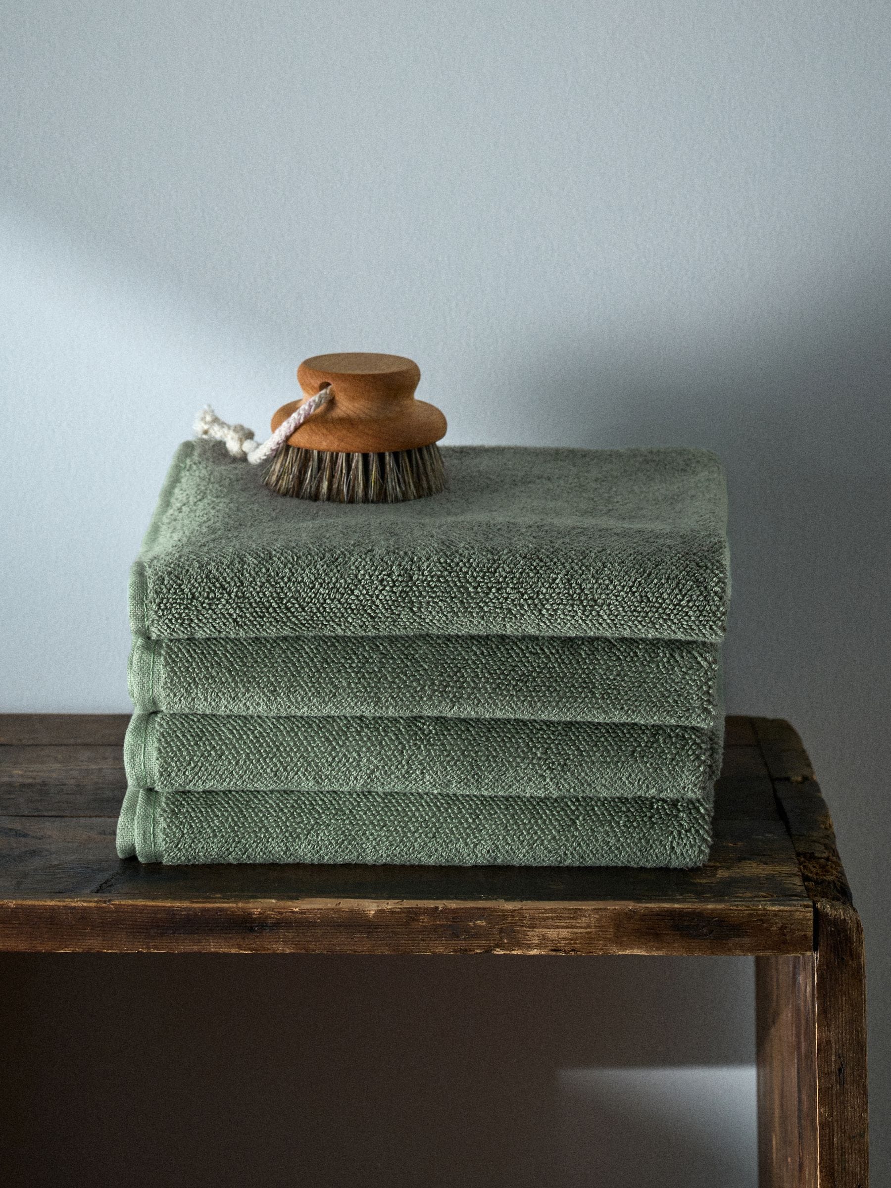 The Set sage green popcorn textured hand towels 4 pack, UK version