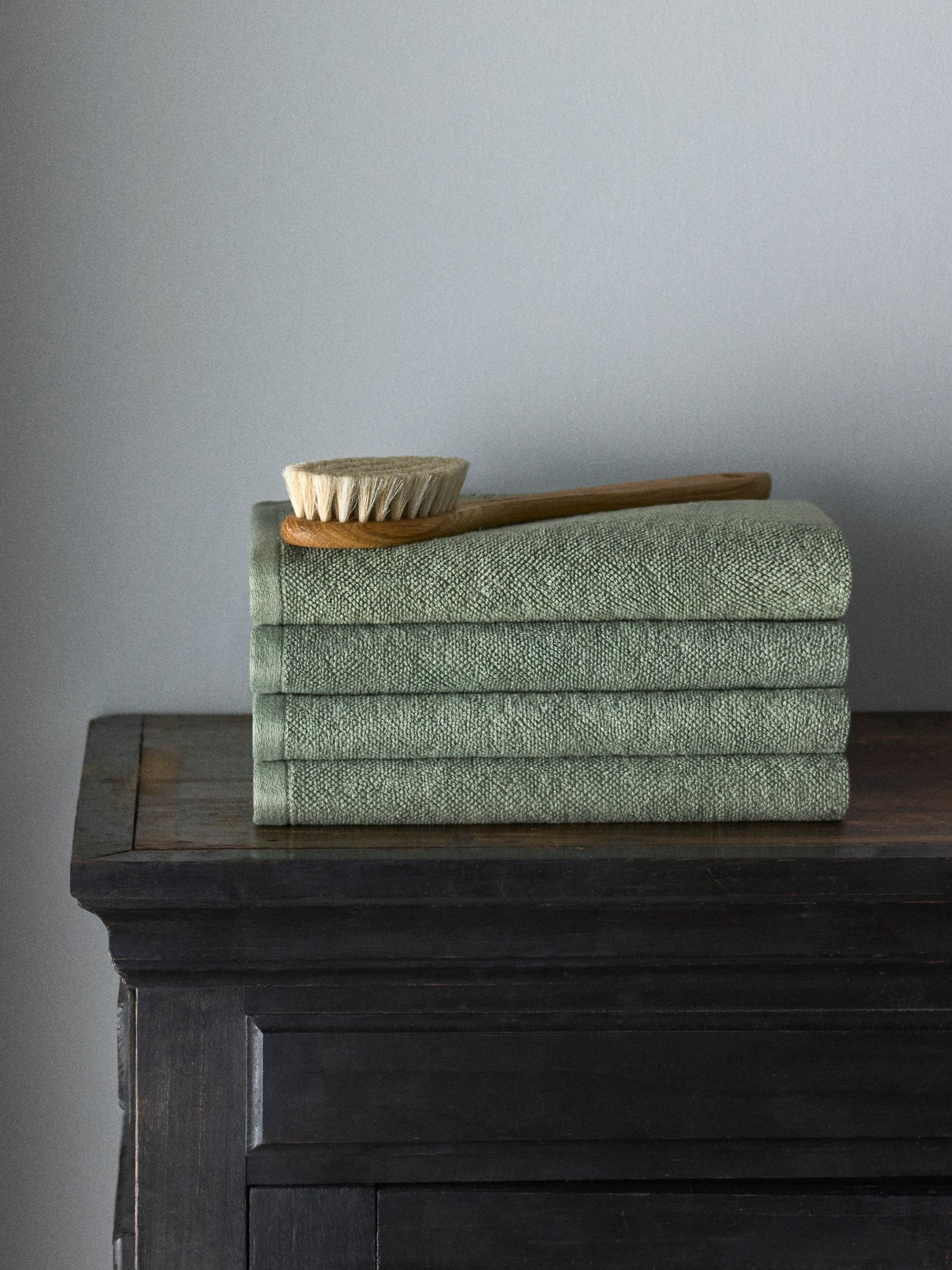 The Set sage green popcorn textured hand towels 4 pack, UK version