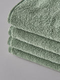 The Set sage green popcorn textured hand towels 4 pack, UK version
