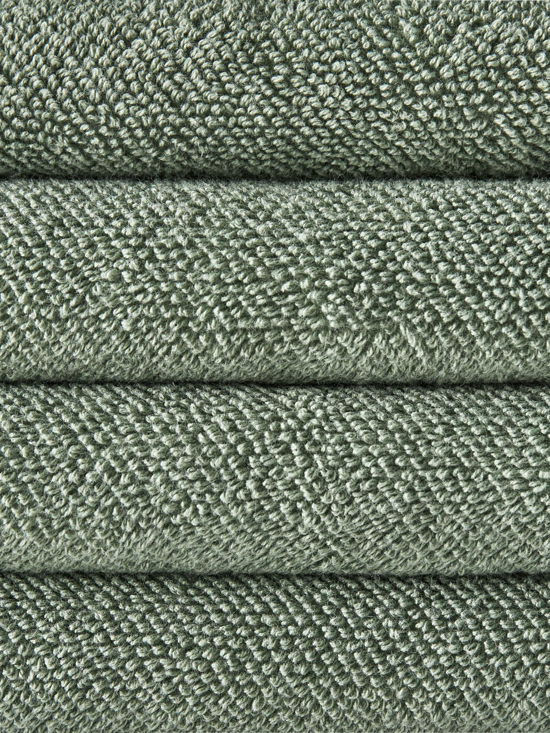 The Set sage green popcorn textured hand towels 4 pack, UK version