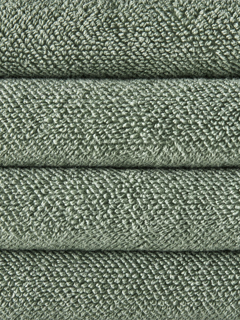 The Set sage green popcorn textured hand towels 4 pack, UK version