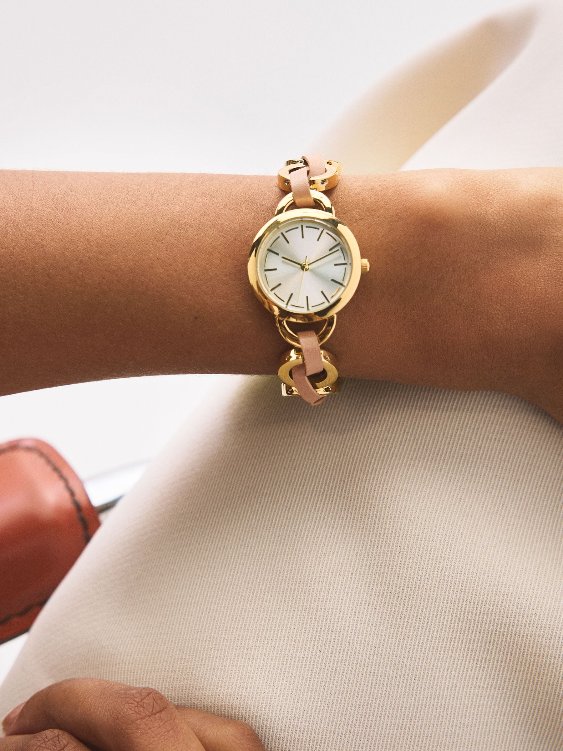 Gold-tone watch with taupe weave PU strap - UK version