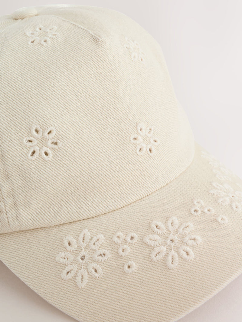 Children's cream baseball cap with laser-cut embroidery (British brand)