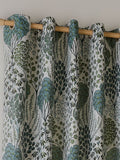Wylder green floral jacquard curtains with eyelet header - British product