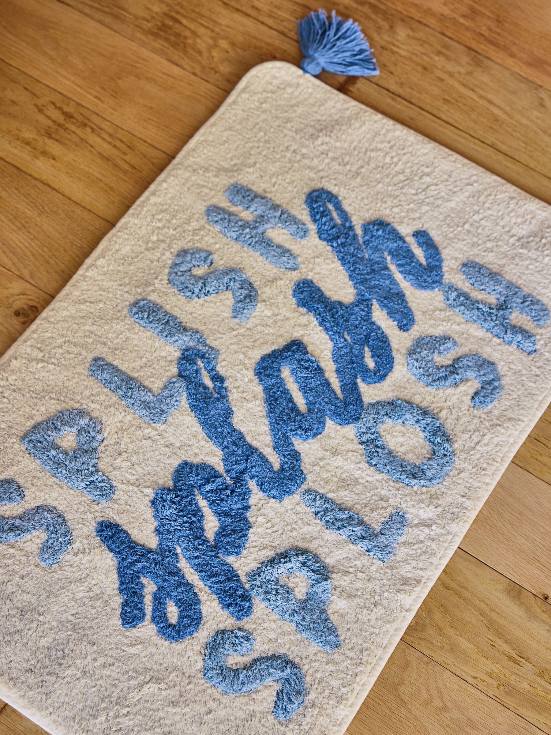FatFace blue splash slogan cotton bath mat, imported from the UK