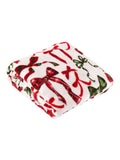 Furn festive fleece throw with bow design, imported from the UK
