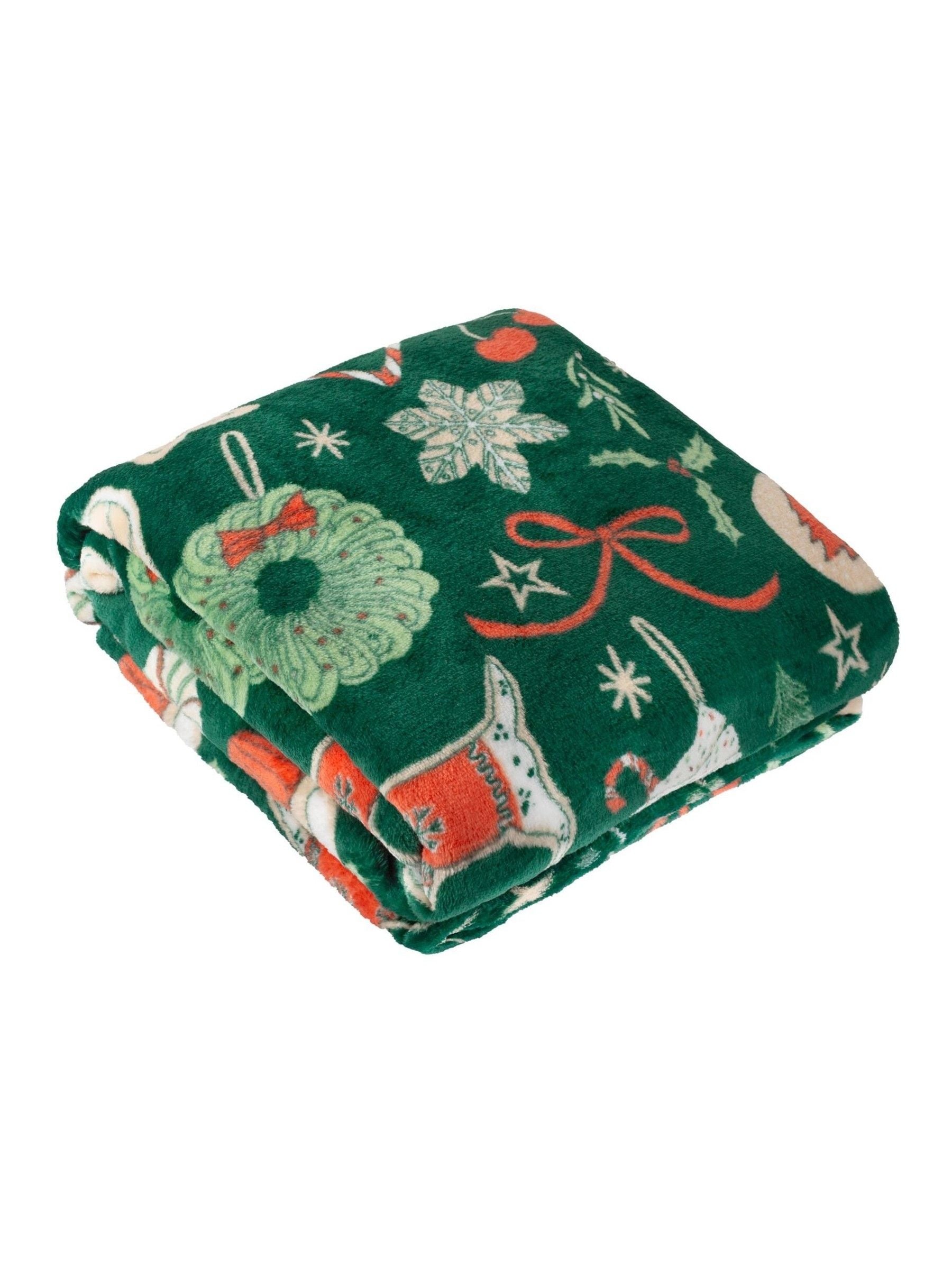 Duvet Day festive fleece throw with Christmas treats print, UK version