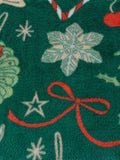 Duvet Day festive fleece throw with Christmas treats print, UK version