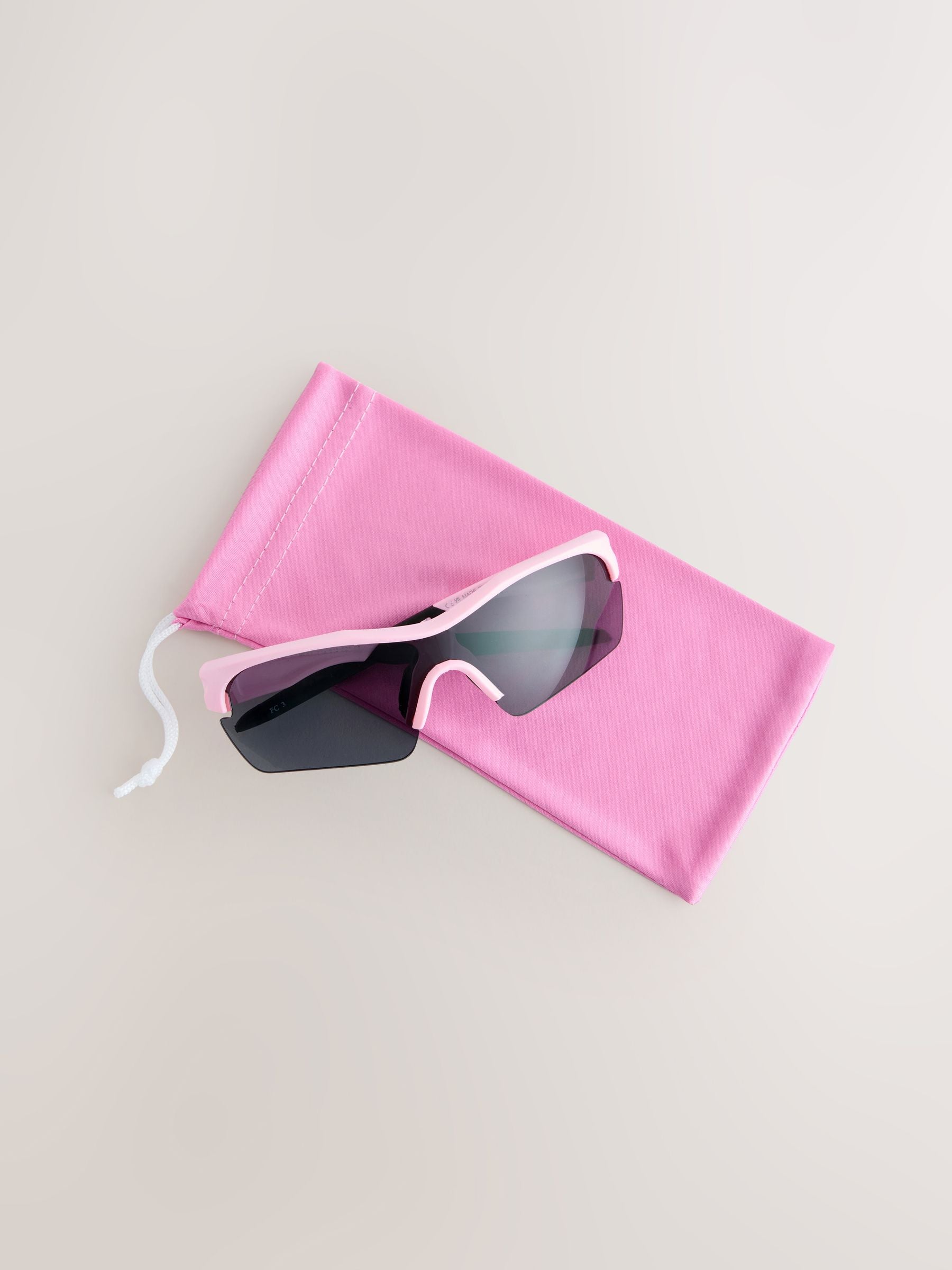 Pink sporty kids sunglasses with recycled materials, UK version