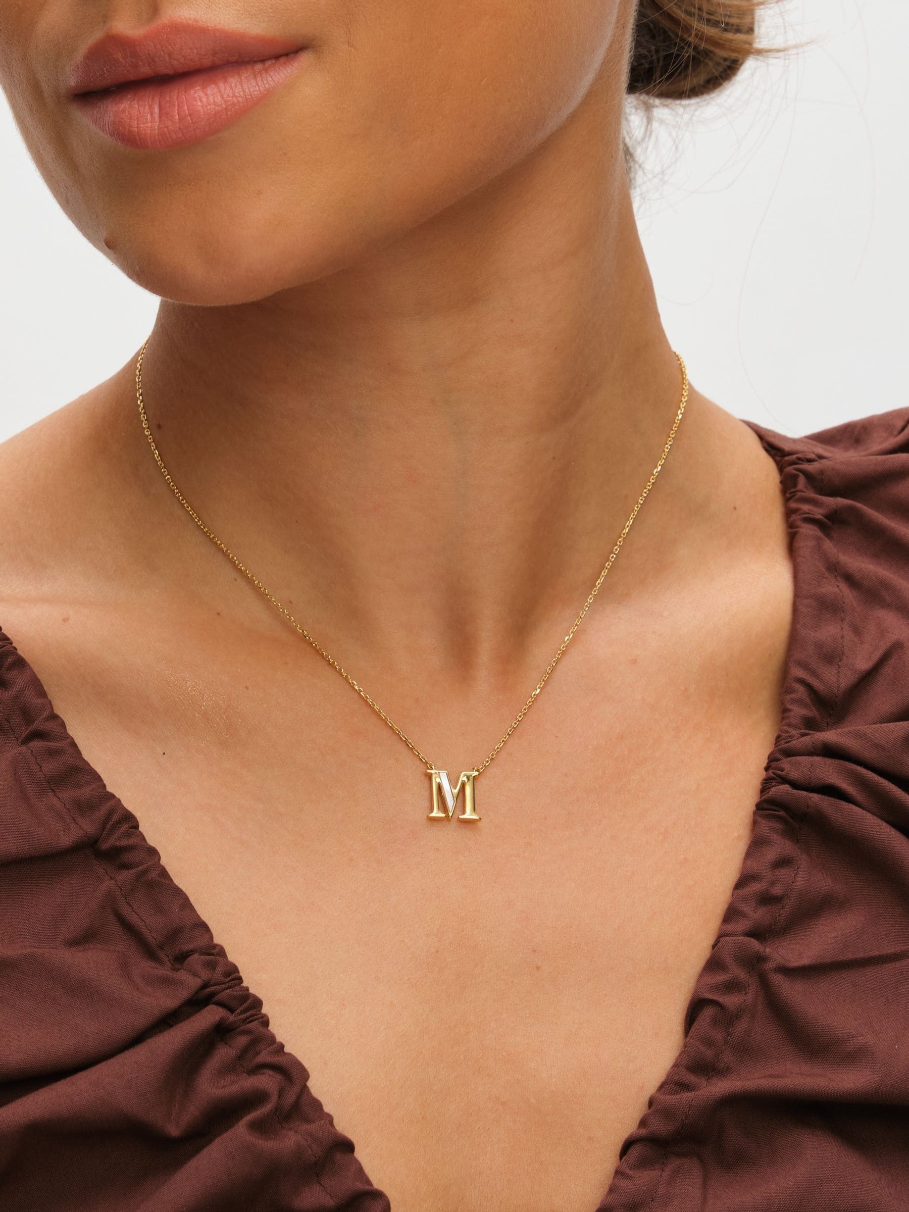 Inicio M initial pendant with mother of pearl and 17-inch chain, UK version