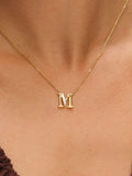 Inicio M initial pendant with mother of pearl and 17-inch chain, UK version