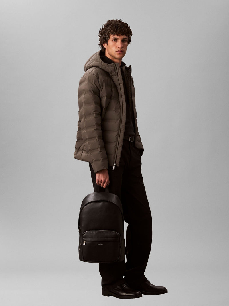 Calvin Klein black micro pebble round backpack - British product