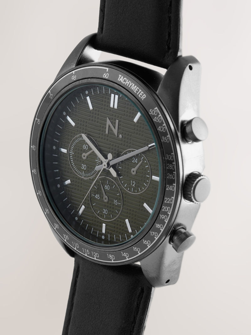Black N. leather strap watch with green checkerboard dial, UK version