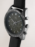 Black N. leather strap watch with green checkerboard dial, UK version