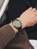 Black N. leather strap watch with green checkerboard dial, UK version