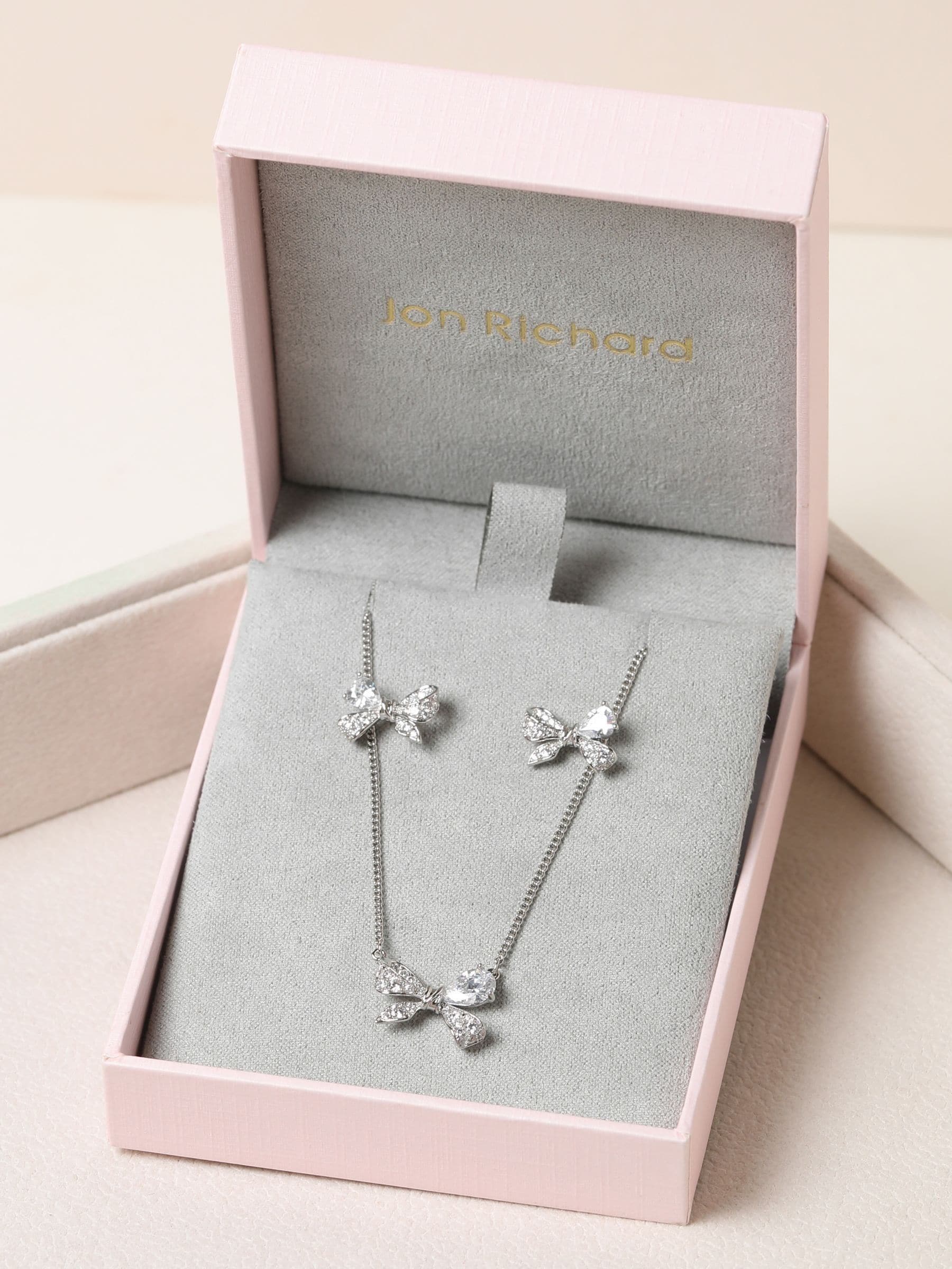 Jon Richard silver rhodium bow set, imported from the UK