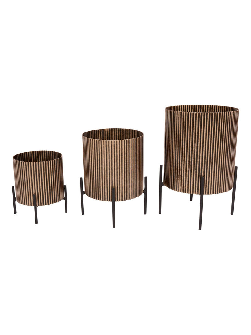 Libra Interiors set of three gold metal planters, UK version