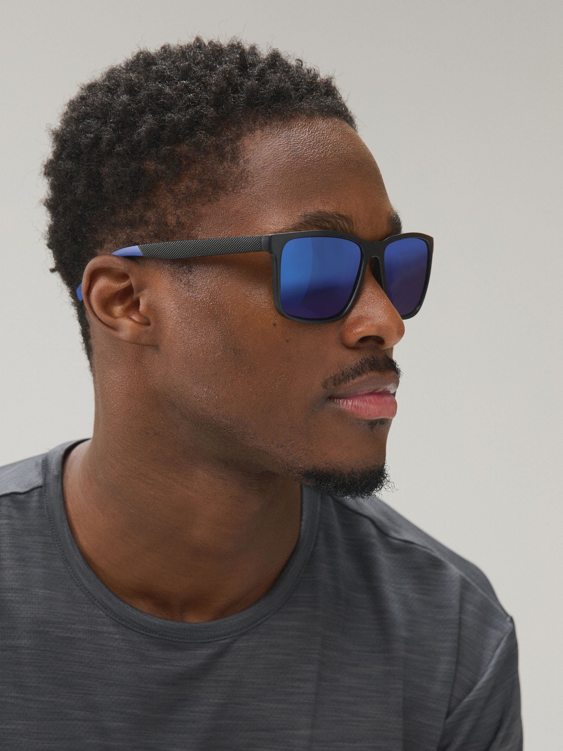 Polarised sport sunglasses with mirror lenses, imported from the UK