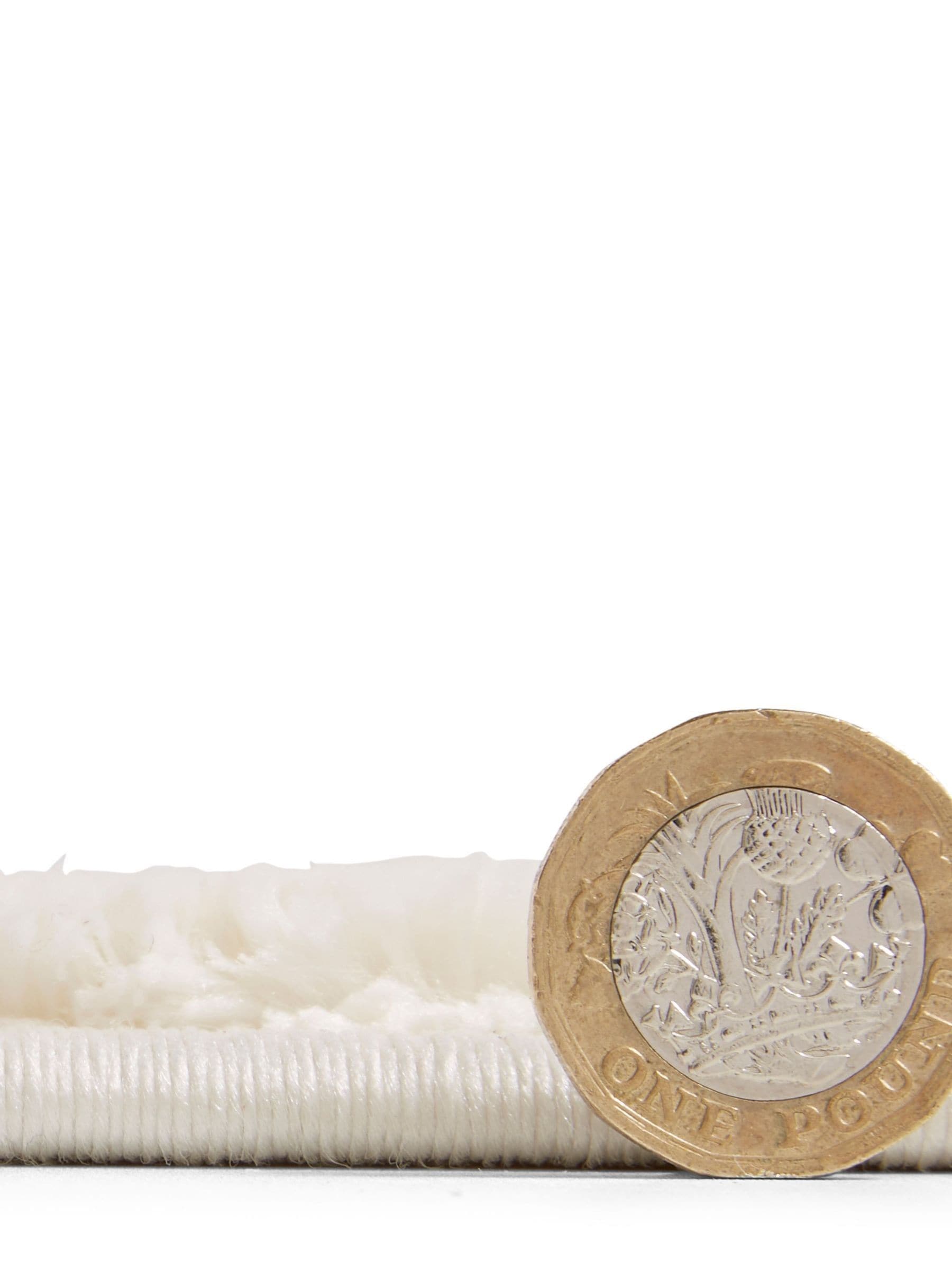 Catherine Lansfield cream cosy diamond washable rug, imported from the UK