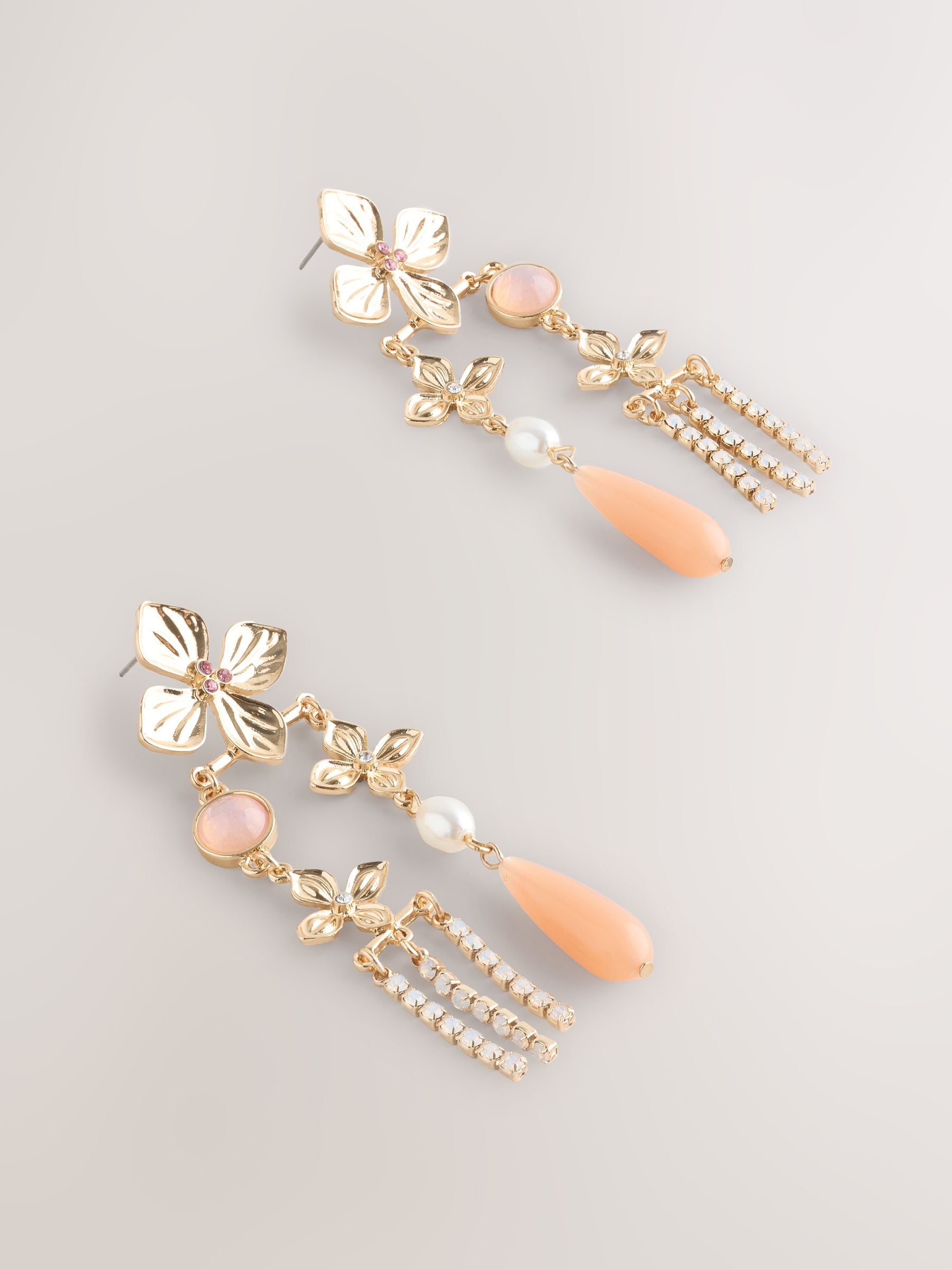 Gold tone floral drop stud earrings, UK version