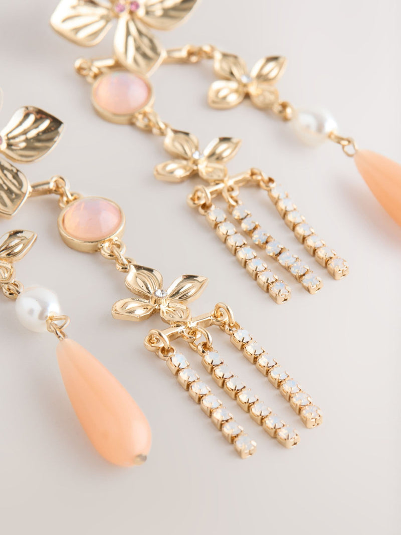 Gold tone floral drop stud earrings, UK version