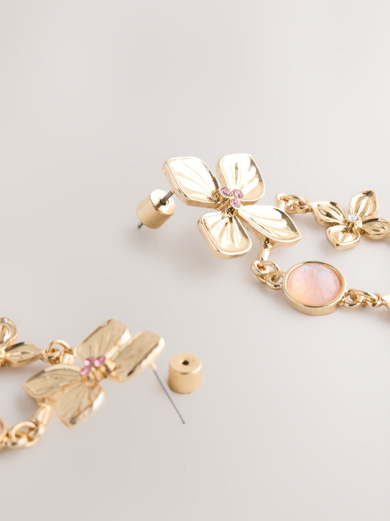 Gold tone floral drop stud earrings, UK version
