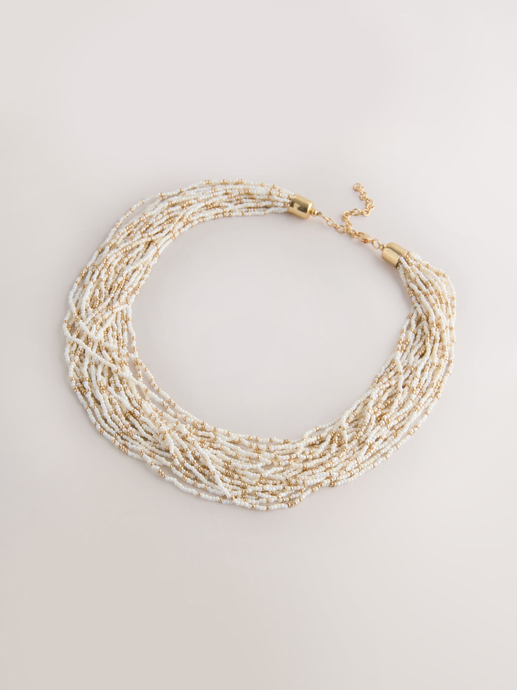 Statement necklace gold tone ecru beads - British product