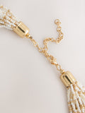Statement necklace gold tone ecru beads - British product